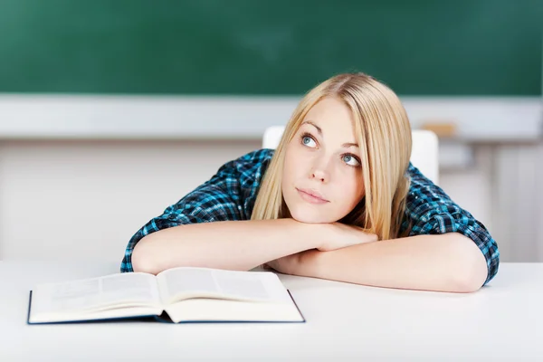 Female Student With Book Leaning On Desk — Stock Photo, Image