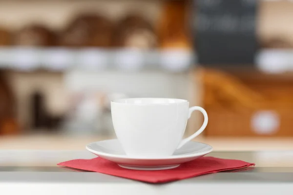 Coffee Cup And Saucer On Tissue Paper — Stock Photo, Image