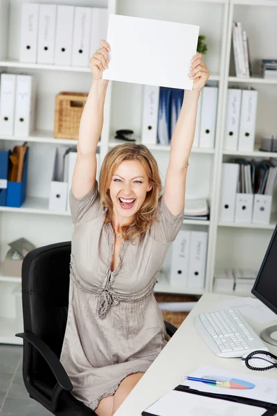 Laughing Businesswoman Holding Blank Paper — Stock Photo, Image