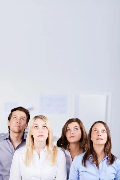 Businesspeople Looking Up In Office — Stock Photo, Image