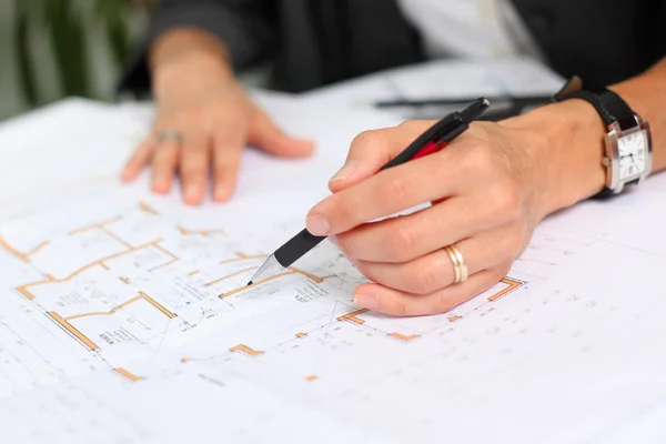 Architects Hands Working On Blue Print At Desk — Stock Photo, Image