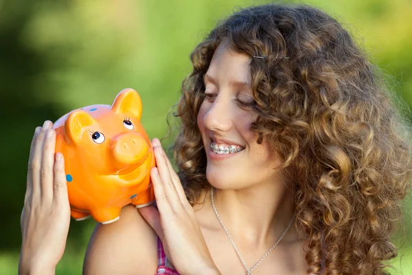 Girl With Piggy Bank — Stock Photo, Image