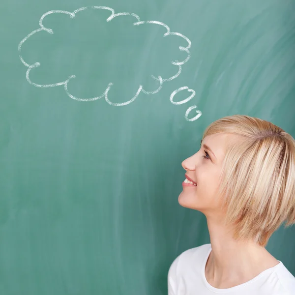 Student with speech bubble on chalkboard — Stock Photo, Image