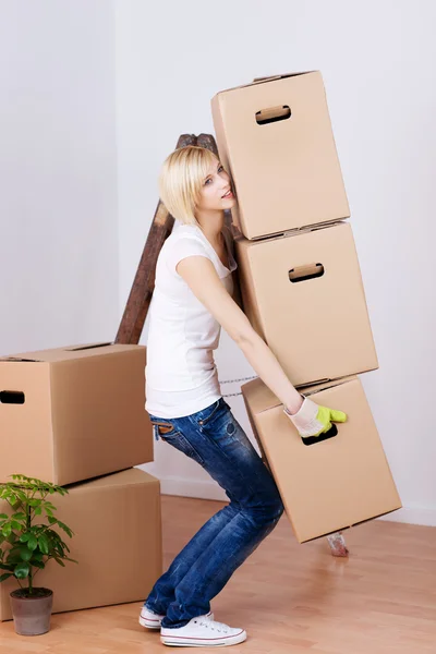 Woman Carrying Heavy Cardboard Boxes In House — Stock Photo, Image