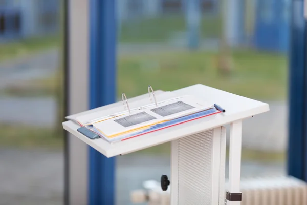 Binder On White Podium — Stock Photo, Image