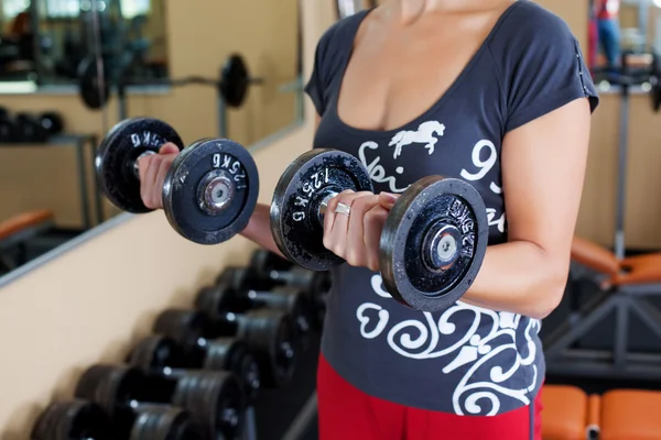 Woman with dumbbell — Stock Photo, Image