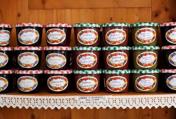 Pile of jam jars made of various fruits — Stock Photo, Image