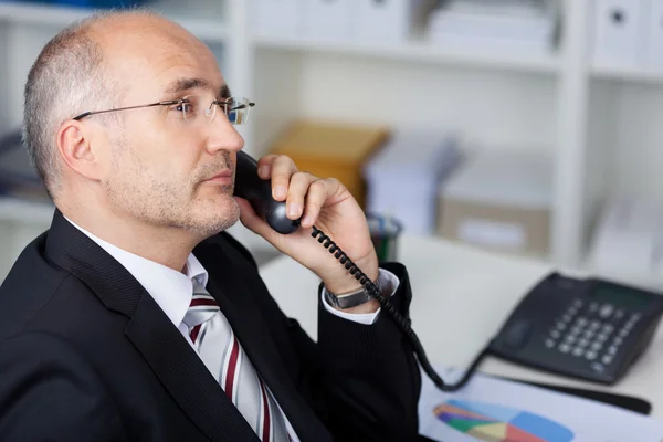 Serious manager at the phone — Stock Photo, Image