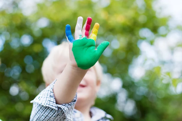 Farbenfrohe kleine Hand — Stockfoto