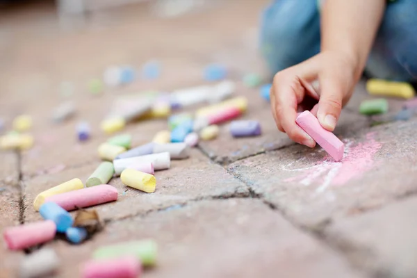 Colorful chalk on the pavement — Stock Photo, Image