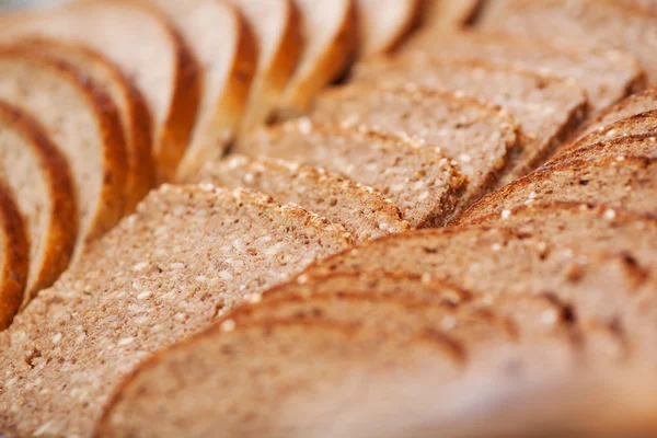 Slices Of Brown Bread In Bakery — Stock Photo, Image