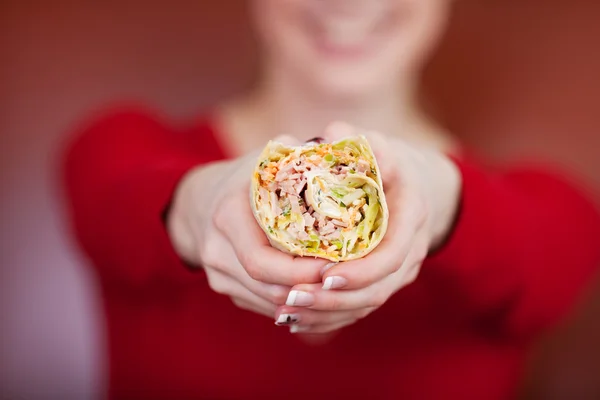 Woman holding wrap in her hands — Stock Photo, Image