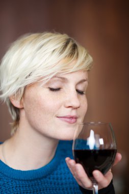 Young Blond Woman With Red Wine Glass clipart