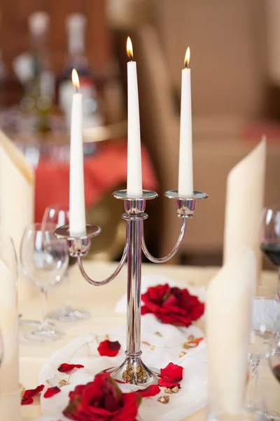 Lit Candles On Holder At Restaurant Table — Stock Photo, Image