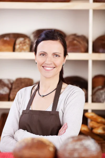 Owner of a bakery standing with folded arms — Stock Photo, Image