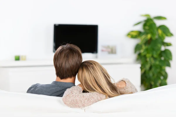 Couple watching tv Stock Image