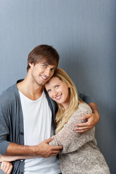 Embracing young couple — Stock Photo, Image