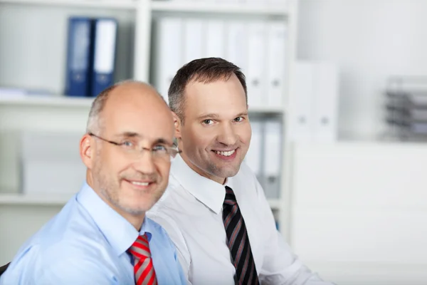 Smiling businessmen — Stock Photo, Image