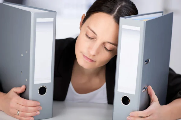 Tired Businesswoman With Binders — Stock Photo, Image