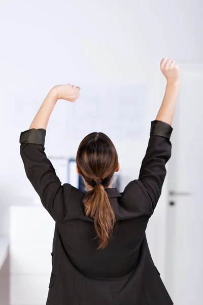Businesswoman Stretching In Office — Stock Photo, Image