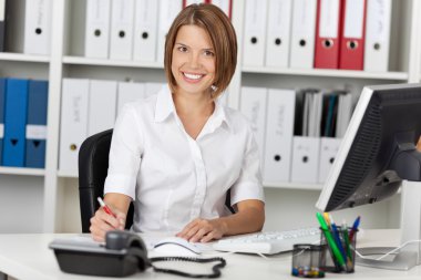 Smiling confident businesswoman clipart