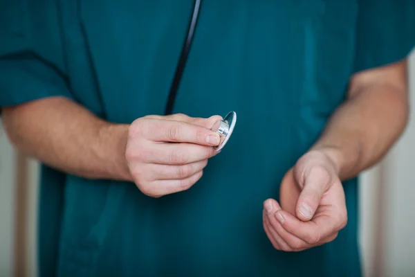 Midsection Of Surgeon Holding Stethoscope — Stock Photo, Image