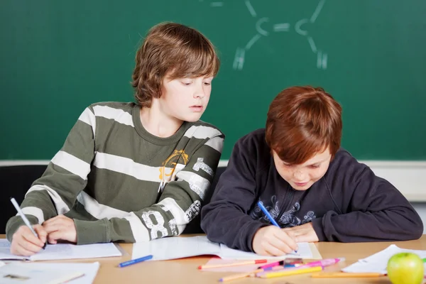 Students writing — Stock Photo, Image