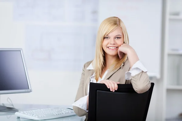 Confident Businesswoman Leaning On Chair — Stock Photo, Image