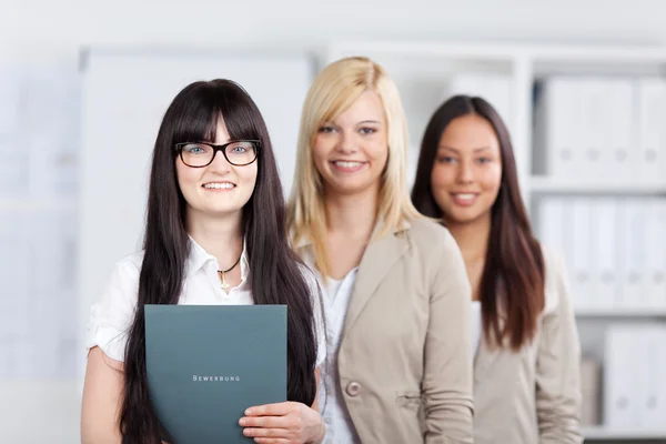 Young woman holding application folder — Stock Photo, Image