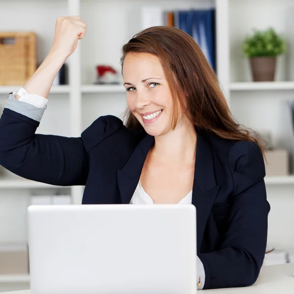 Female executive expressing joy of achievement — Stock Photo, Image