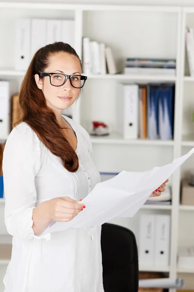 Attractive businesswoman with documents Stock Photo