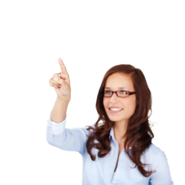 Sorrindo mulher apontando o dedo — Fotografia de Stock