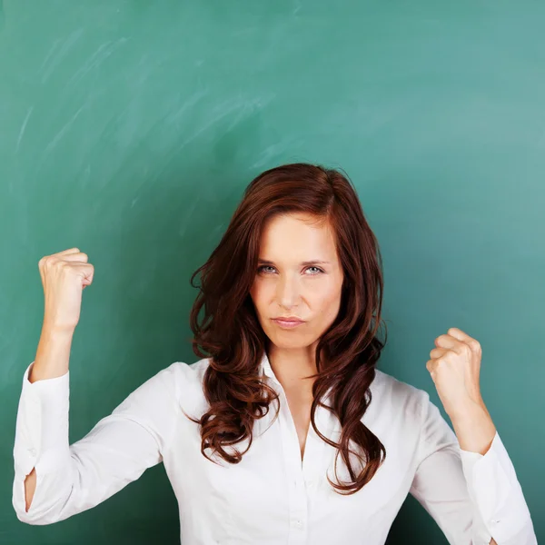 Angry woman shaking her fists — Stock Photo, Image