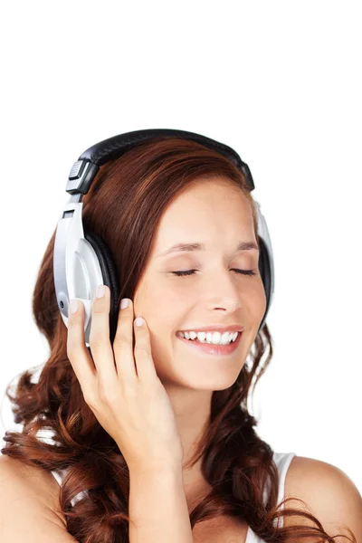 Young woman listening to music — Stock Photo, Image