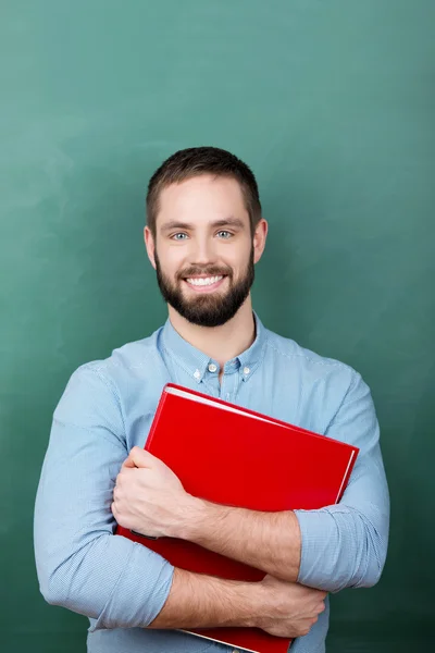 Male Student Standing In Classroom — Stock fotografie