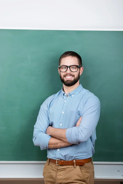 Estudante vestindo óculos contra papelão — Fotografia de Stock