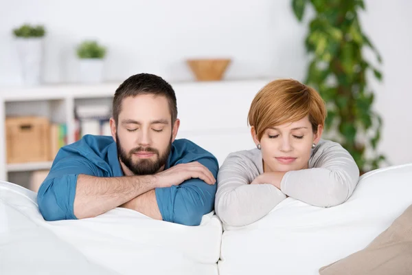 Couple With Eyes Closed On Sofa — Stock Photo, Image