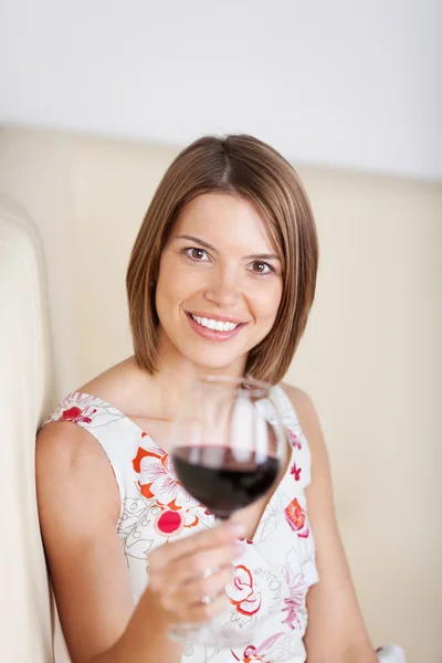 Woman drinking red wine in a restaurant — Stock Photo, Image