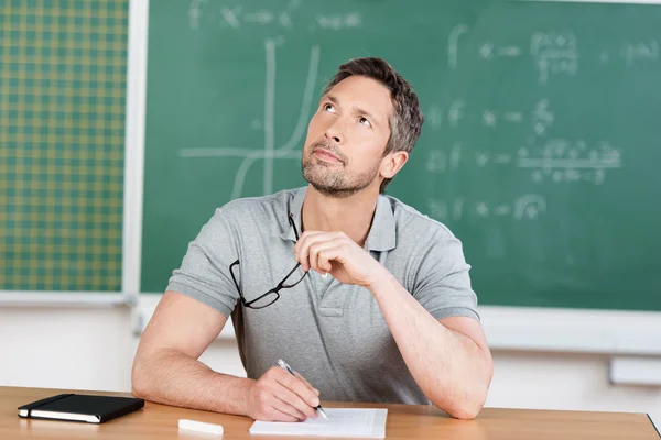 Thinking Teacher In Classroom — Stock Photo, Image