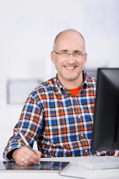 Businessman Using Digitized Pen At Desk In Office — Stock Photo, Image