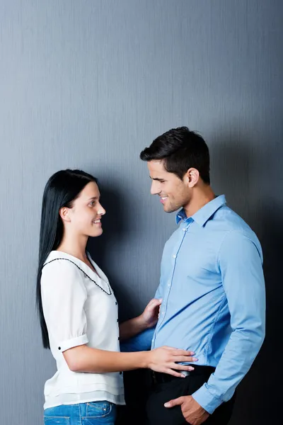 Young couple in love standing next to each other — Stock Photo, Image