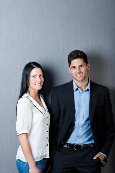 Businesspeople Standing Against Blue Wall — Stock Photo, Image