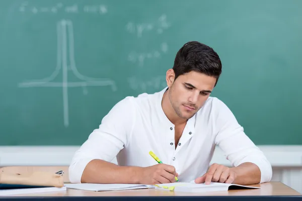 Young man in university — Stock Photo, Image