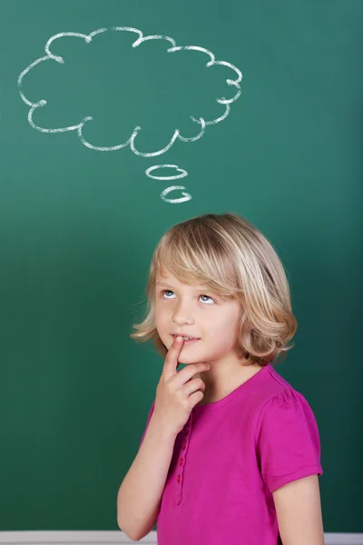 Schoolgirl with a thinking comic strip balloon — Zdjęcie stockowe