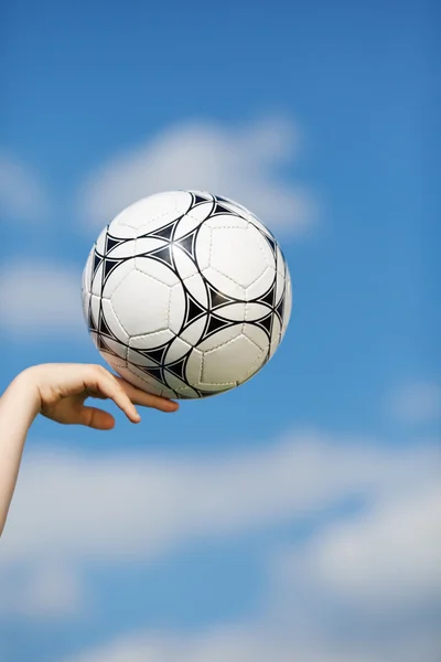 Boys Hand Balancing Soccer Ball Against Sky — Stock Photo, Image
