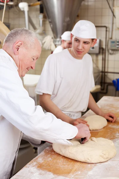 Due generazioni al lavoro — Foto Stock