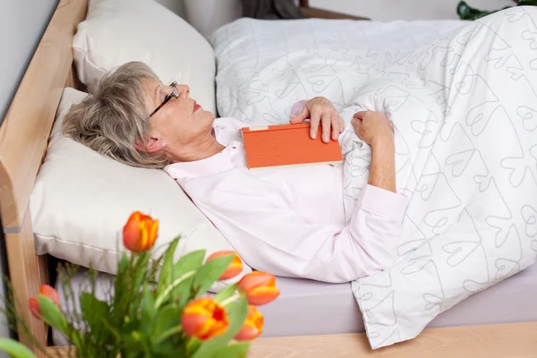 Senior woman fall asleep — Stock Photo, Image