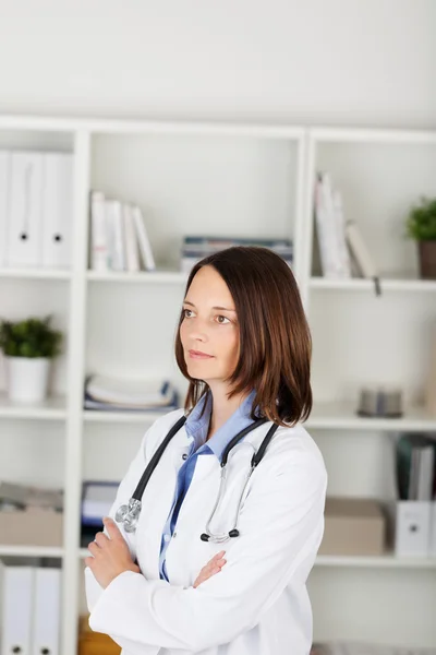Pensive young woman doctor — Stock Photo, Image