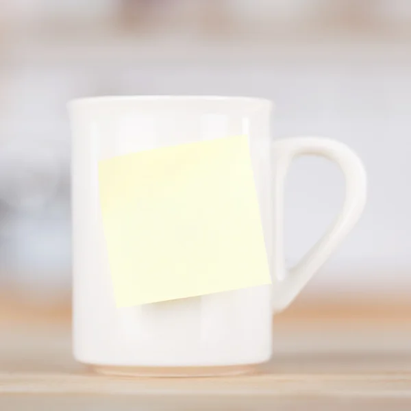 Caneca de café com etiqueta em branco — Fotografia de Stock