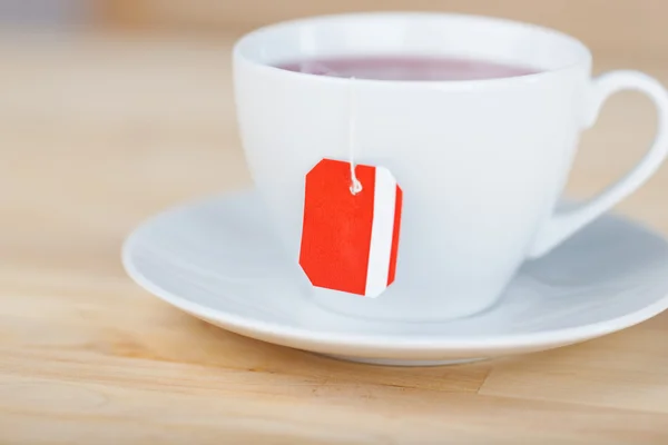 Teabag in a cup of tea — Stock Photo, Image